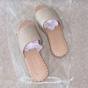 Brand new Woven slip on sandals. Size 7